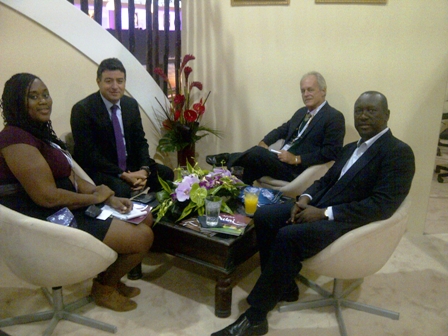 St. Kitts and Nevis Tourism Officials (left) Chairman of the Board of the Nevis Tourism Authority Ms. Keisha Jones, (third from right) Advisor to Tourism in the Nevis Island Administration Mr. Alastair Yearwood and (right) Chairman of the Board of Directors of the St. Kitts Tourism Authority Mr. Alfonso O’Garro at a meeting with a potential Dubai investor (middle) on November 07, 2012, at the World Travel Market 2012 in London